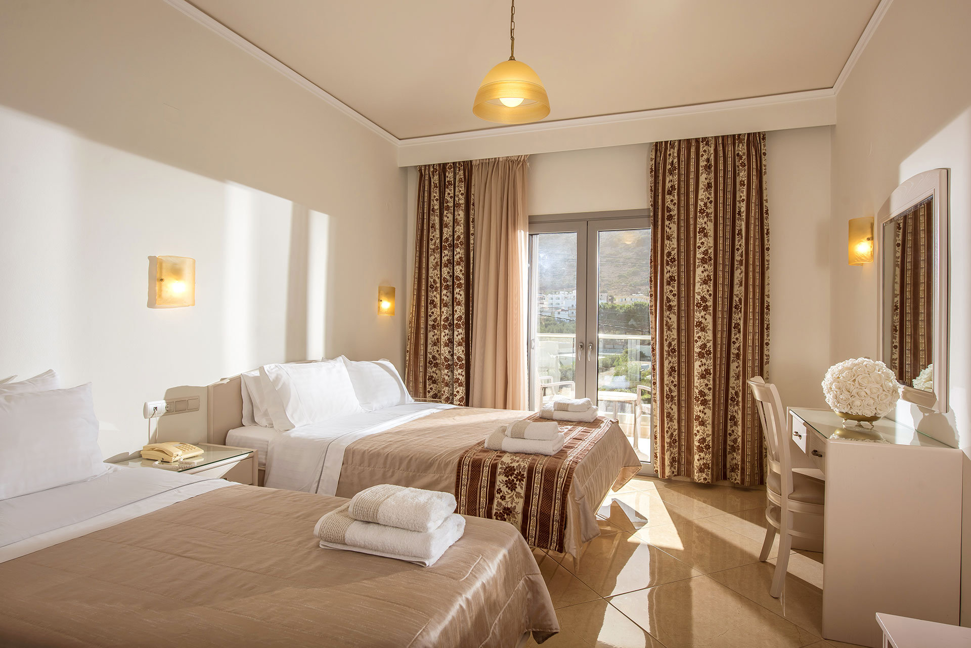 Ariadne Hotel Malia Standard Room twin double bed, balcony view and amenities